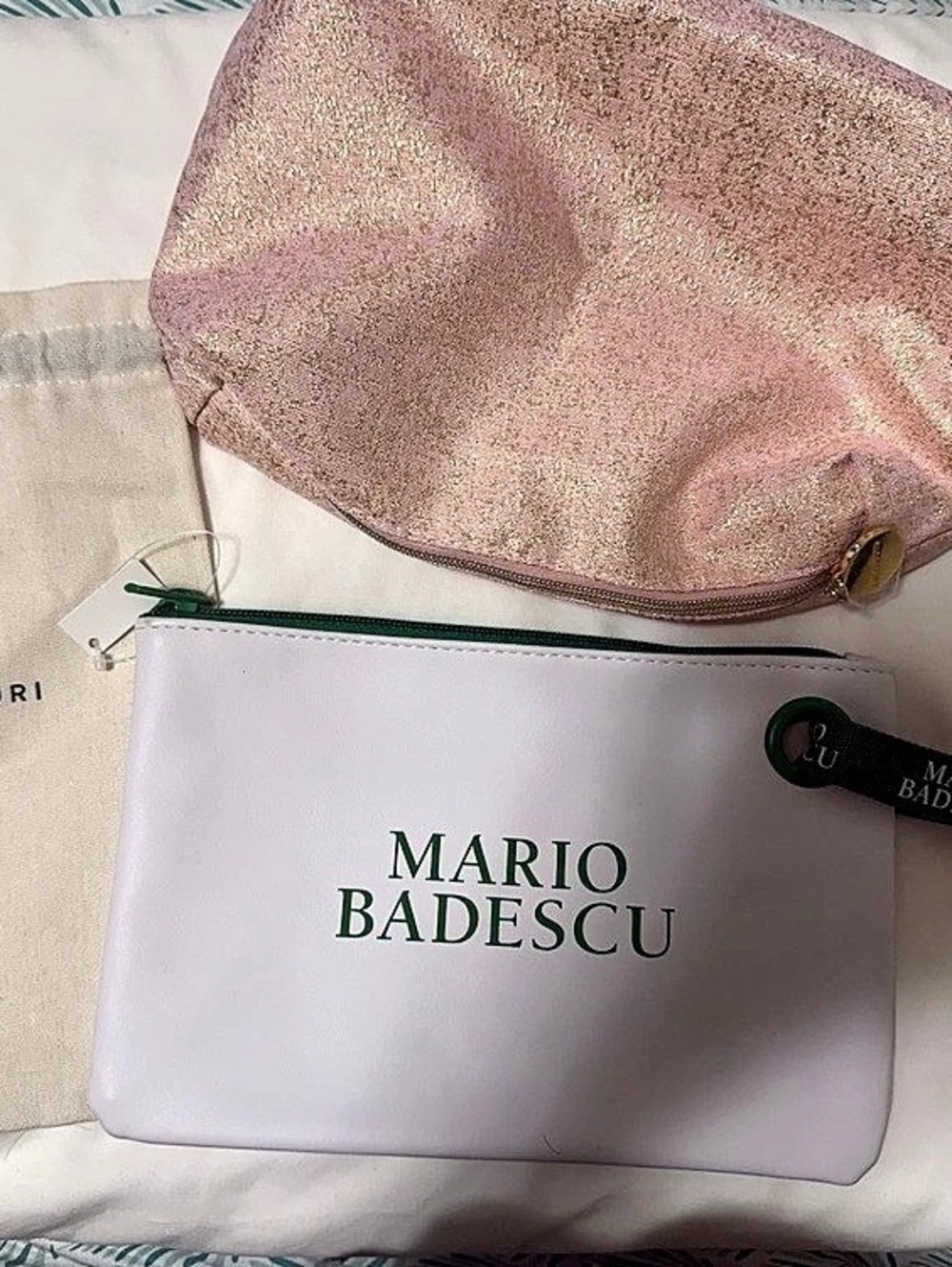 Mario Badescu Mejuri and Estée Lauder pouches